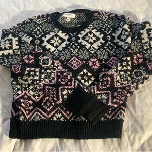 Children size 16. Black with pink colors 
Pattern
Stitch and pine brand